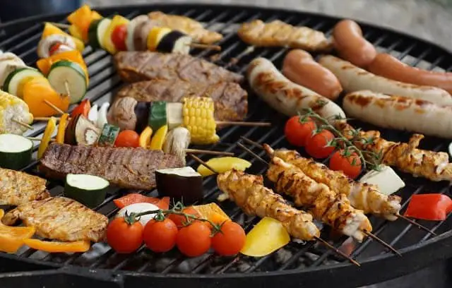 a variety of food on a grill