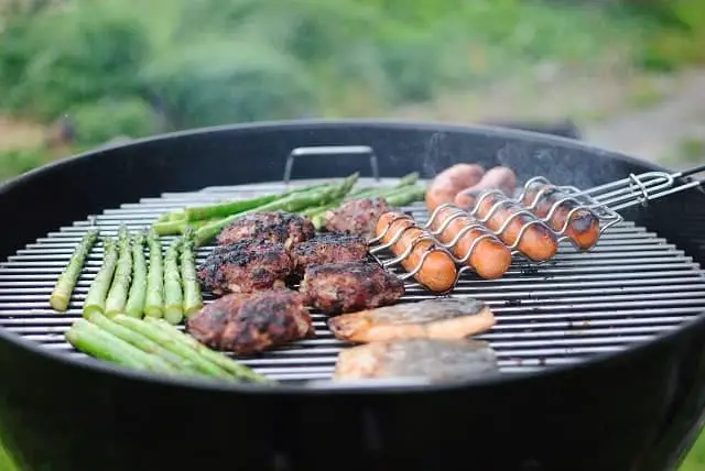 Grilling Meat on Charcoal Grill