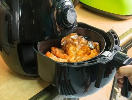 Air fryer cooking chicken wings